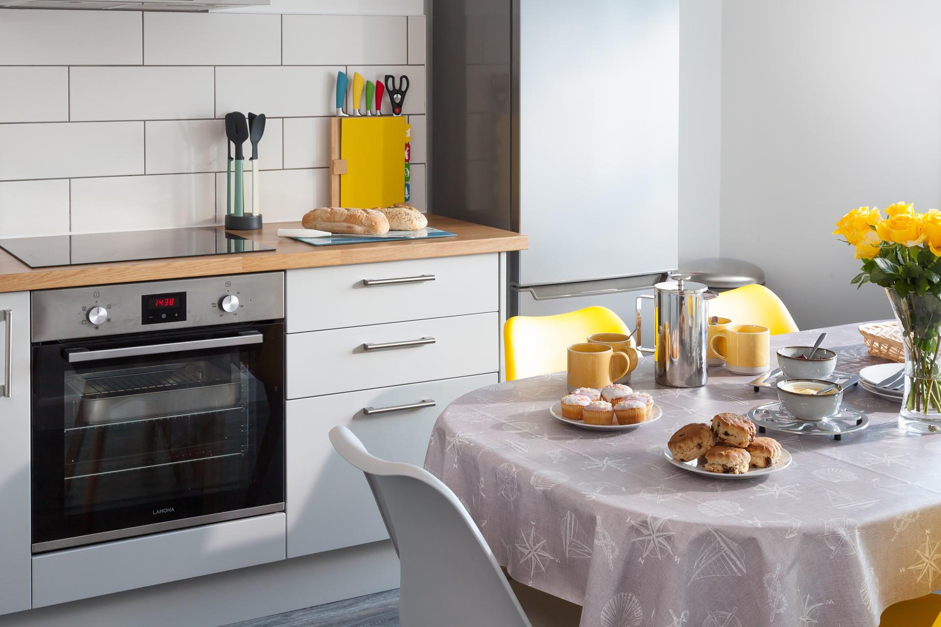 Enjoy a delicious Cornish cream tea bought locally.