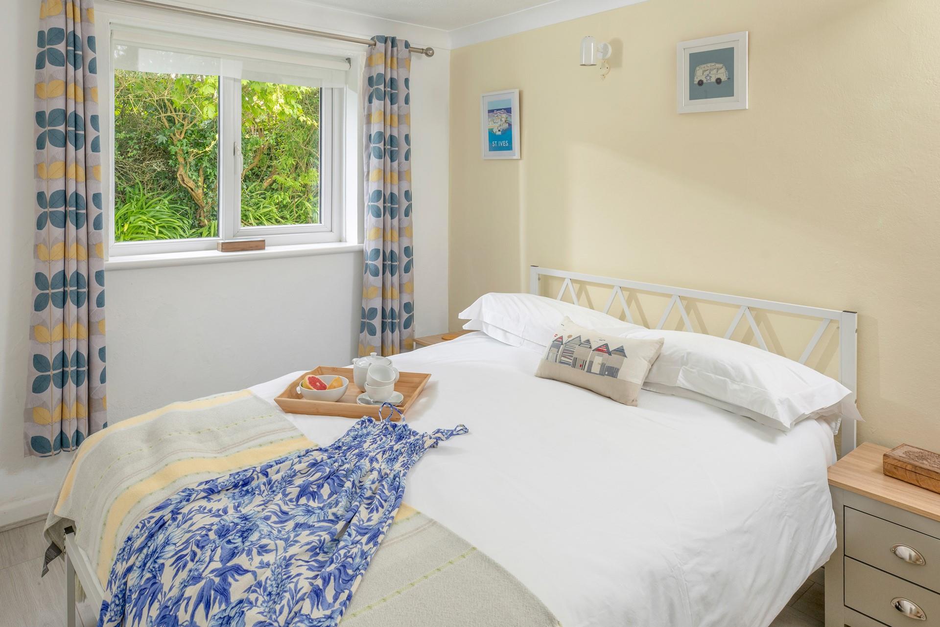 Settle into bed after an evening barbecue on the beach. Doze off for a blissful night's sleep.