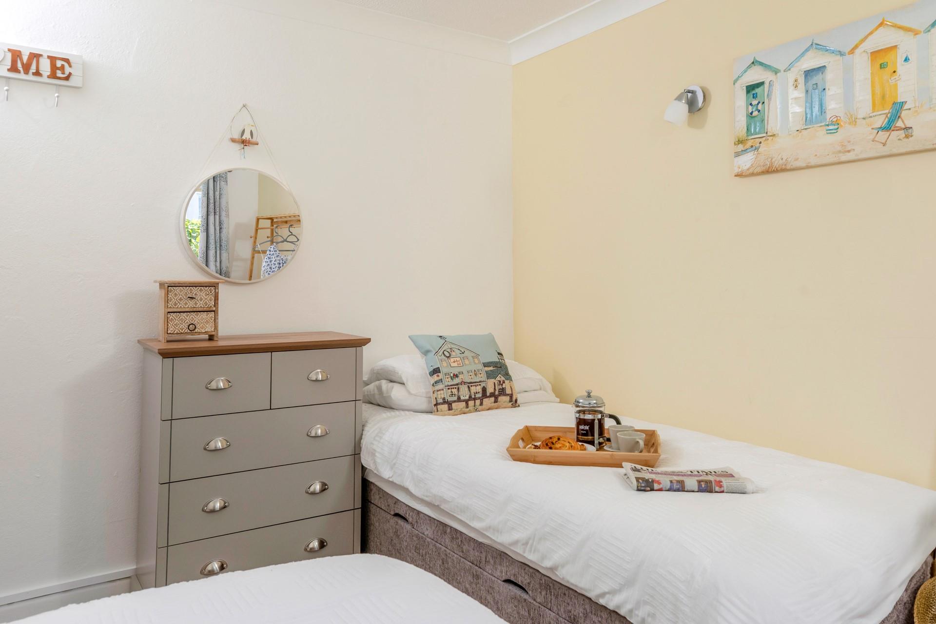 The twin room is tranquil coastal haven!