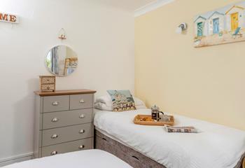 The twin room is tranquil coastal haven!