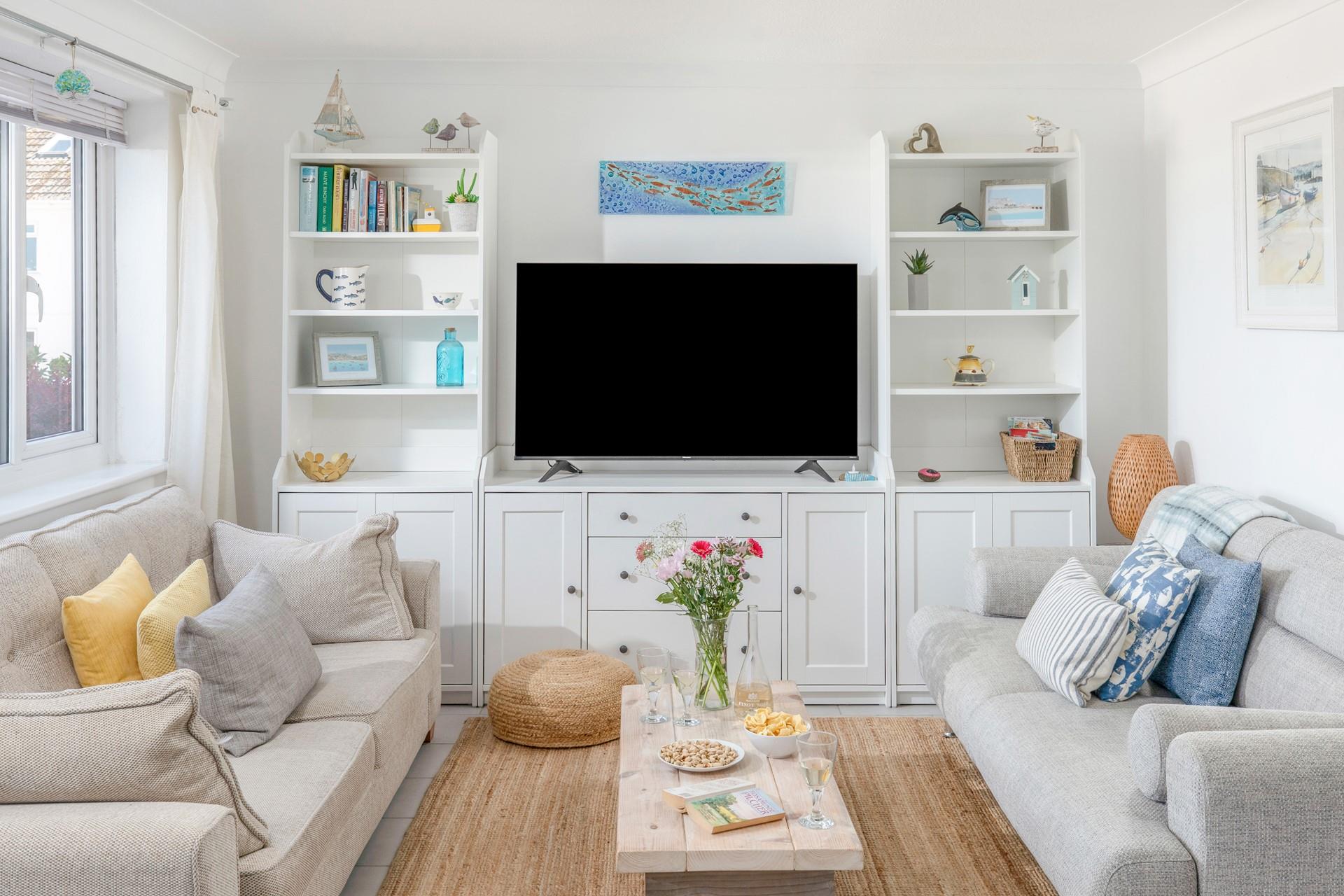 Open a bottle of wine after a busy day exploring some Cornish hidden gems.