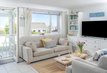 Tuck into some nibbles in the comfortable sitting room.