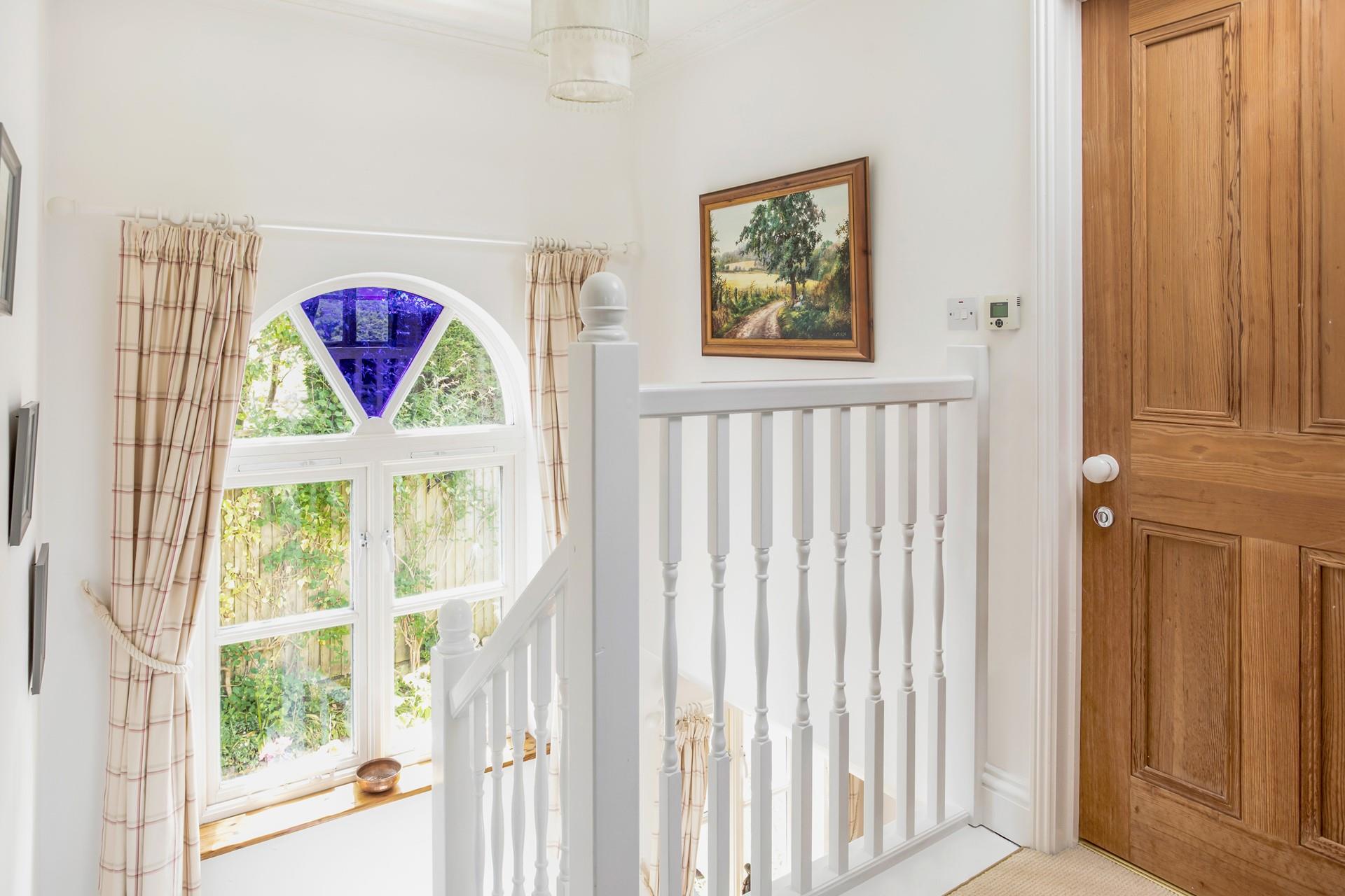 The huge window fills the house with light, even on a grey day. 