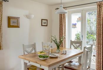 There are doors to the back patio from the dining area, so you can let in a breeze on a hot summer's day. 