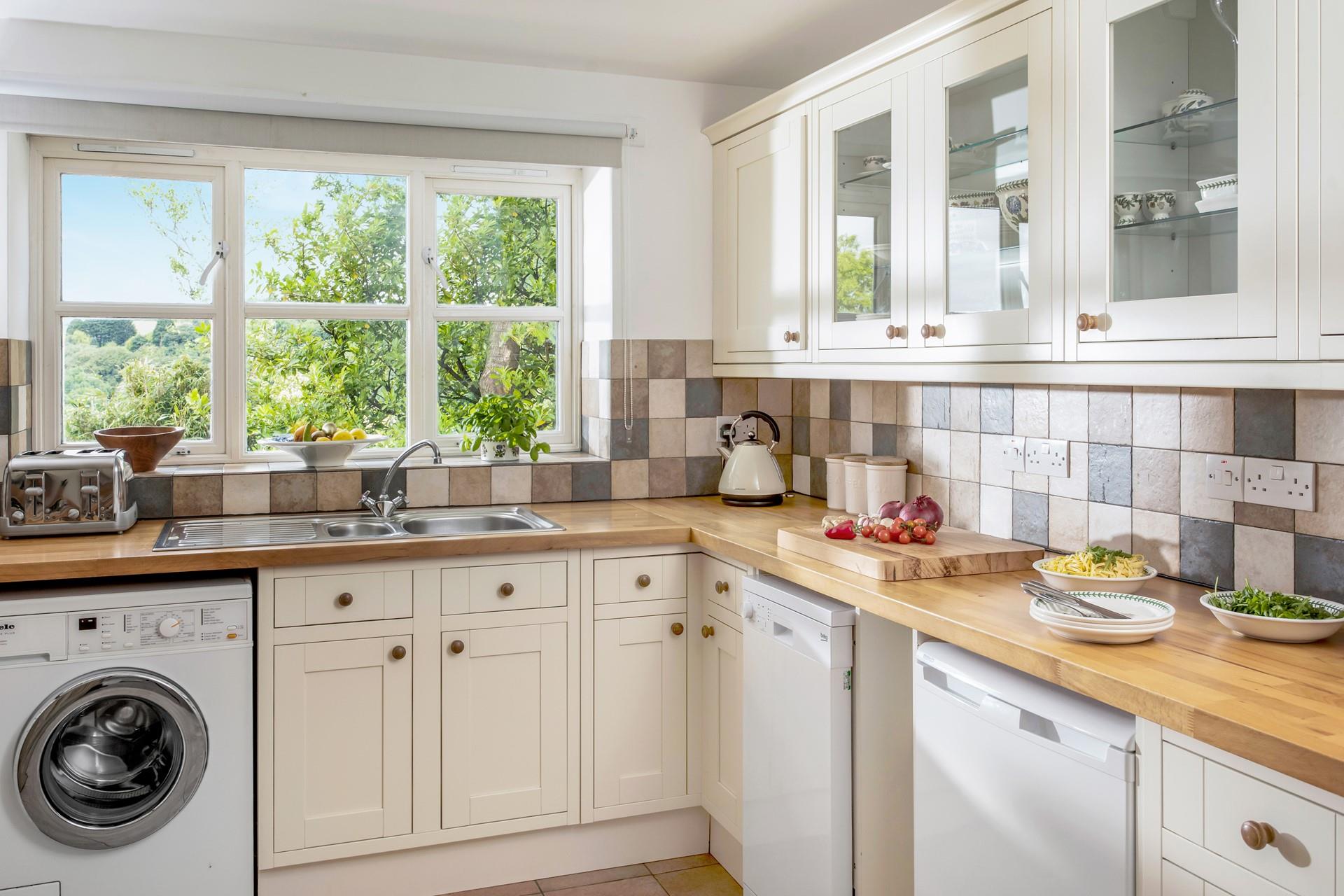 The country-style kitchen has all your self-catering essentials, to cook up a delicious meal for the family. 