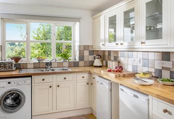 The country-style kitchen has all your self-catering essentials, to cook up a delicious meal for the family. 