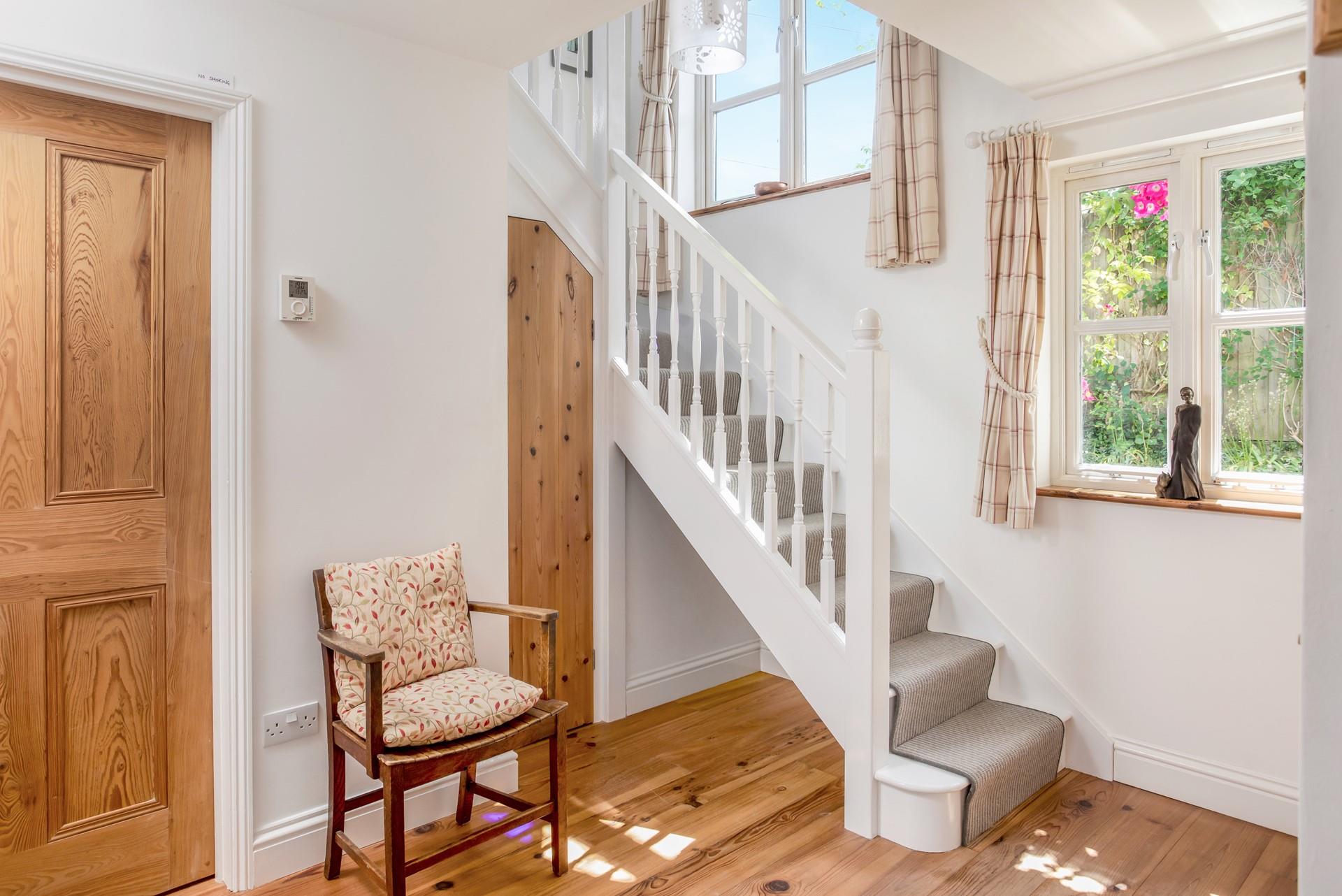 Climb the stairs to the cosy bedrooms and retire into the soft sheets.