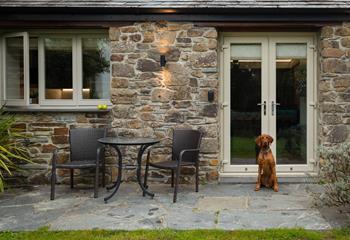 In warmer months throw open the French doors to dine al fresco in the cute cottage garden. 