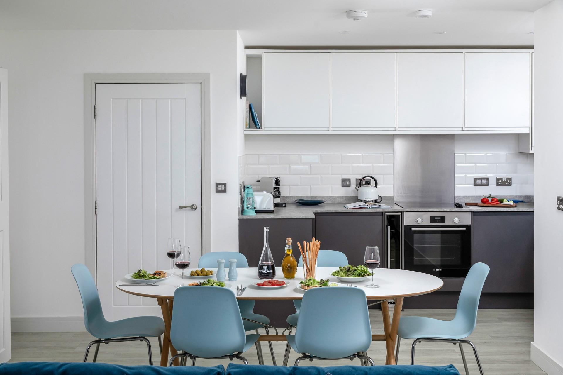 The sleek kitchen is modern and has all you need to cook up delicious holiday dinners.