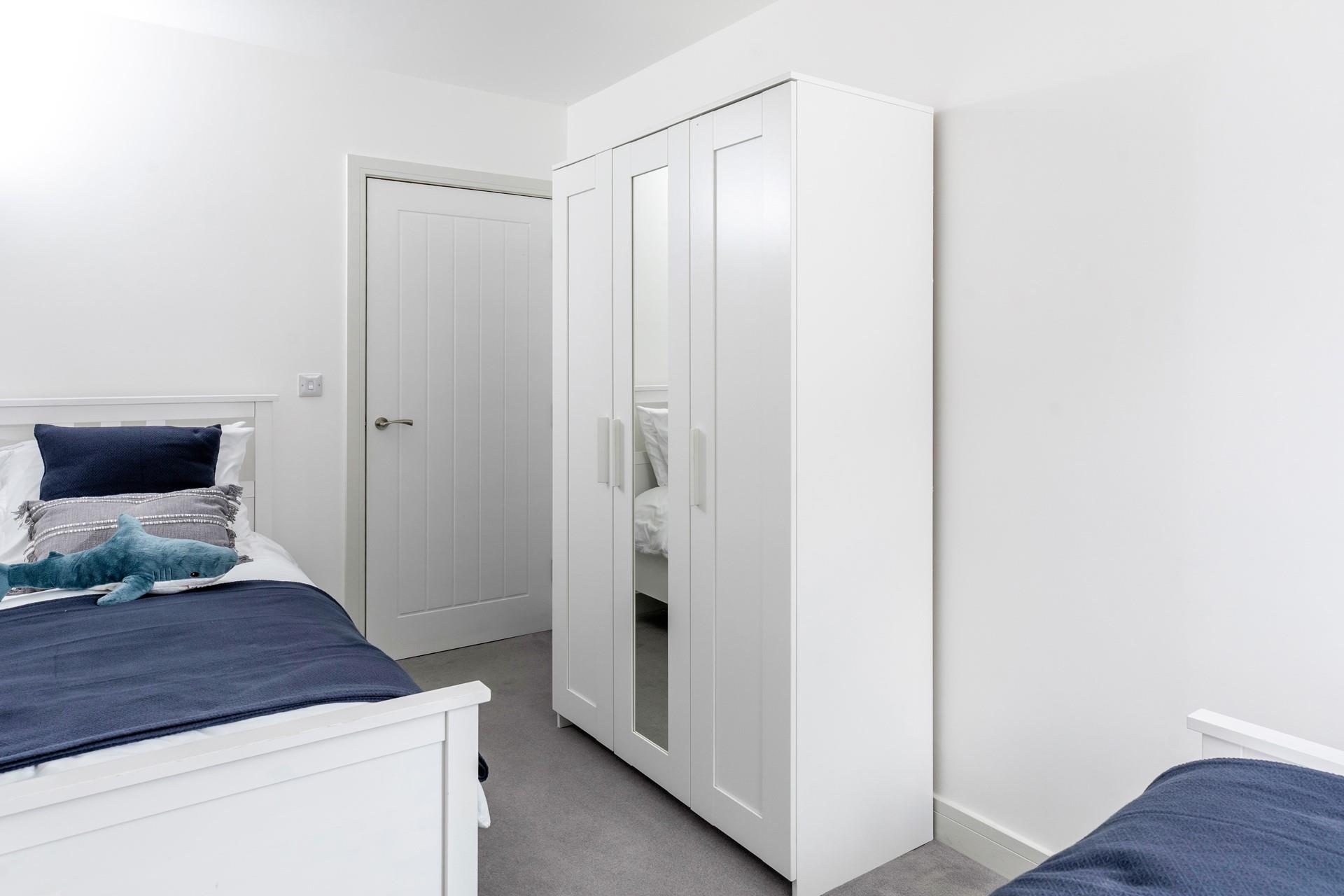 The triple wardrobe offers plenty of storage space!