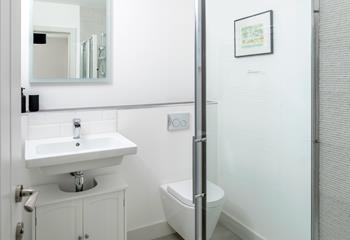 The en suite is sleek and modern.