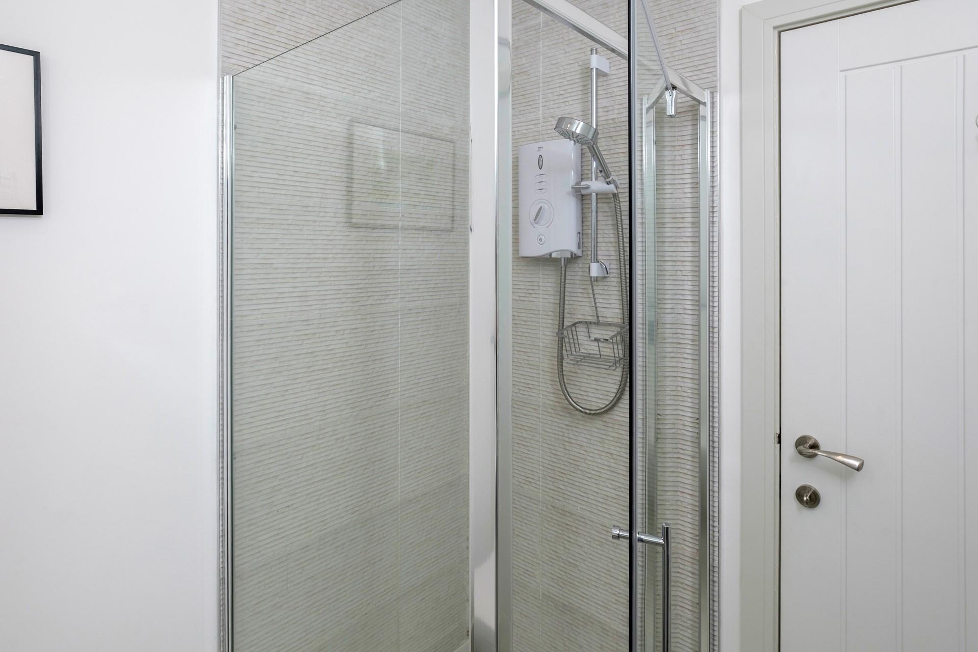 A walk in shower is perfect for rinsing after beach days and sea dips.