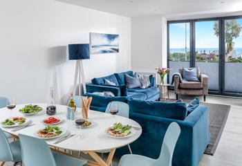 Open plan living makes the most of the sea view.