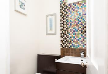 The property benefits from a cloakroom, allowing you to quickly freshen up before heading out.