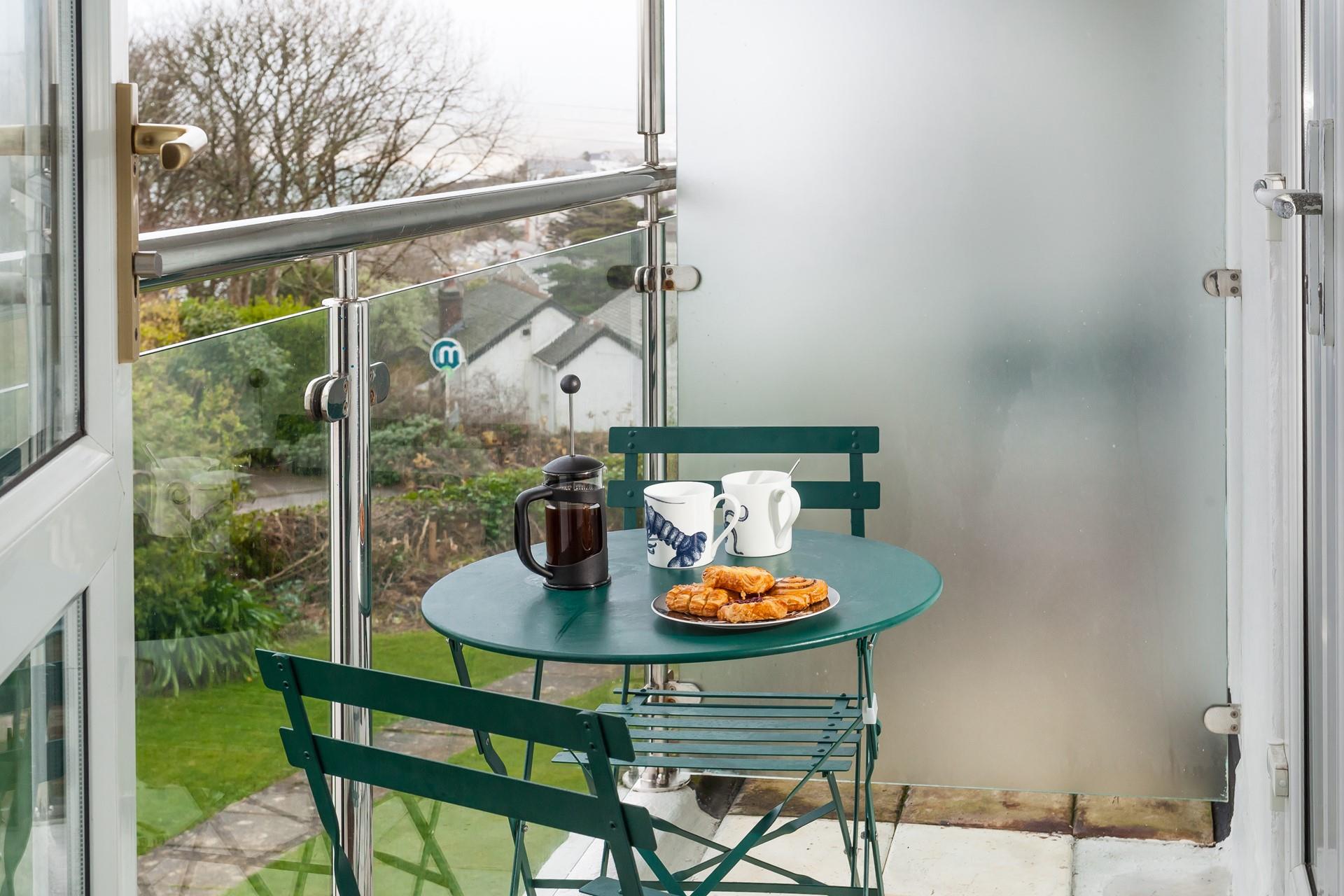 Enjoy a lazy morning cup of coffee on the balcony overlooking Carbis Bay. 