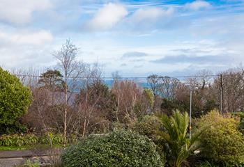 Blue Wheal boasts views over the colourful canopy of trees and across the turquoise bay. 