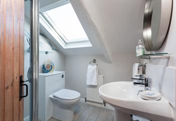 Bedroom 3 benefits from an en suite shower room in the eaves. 