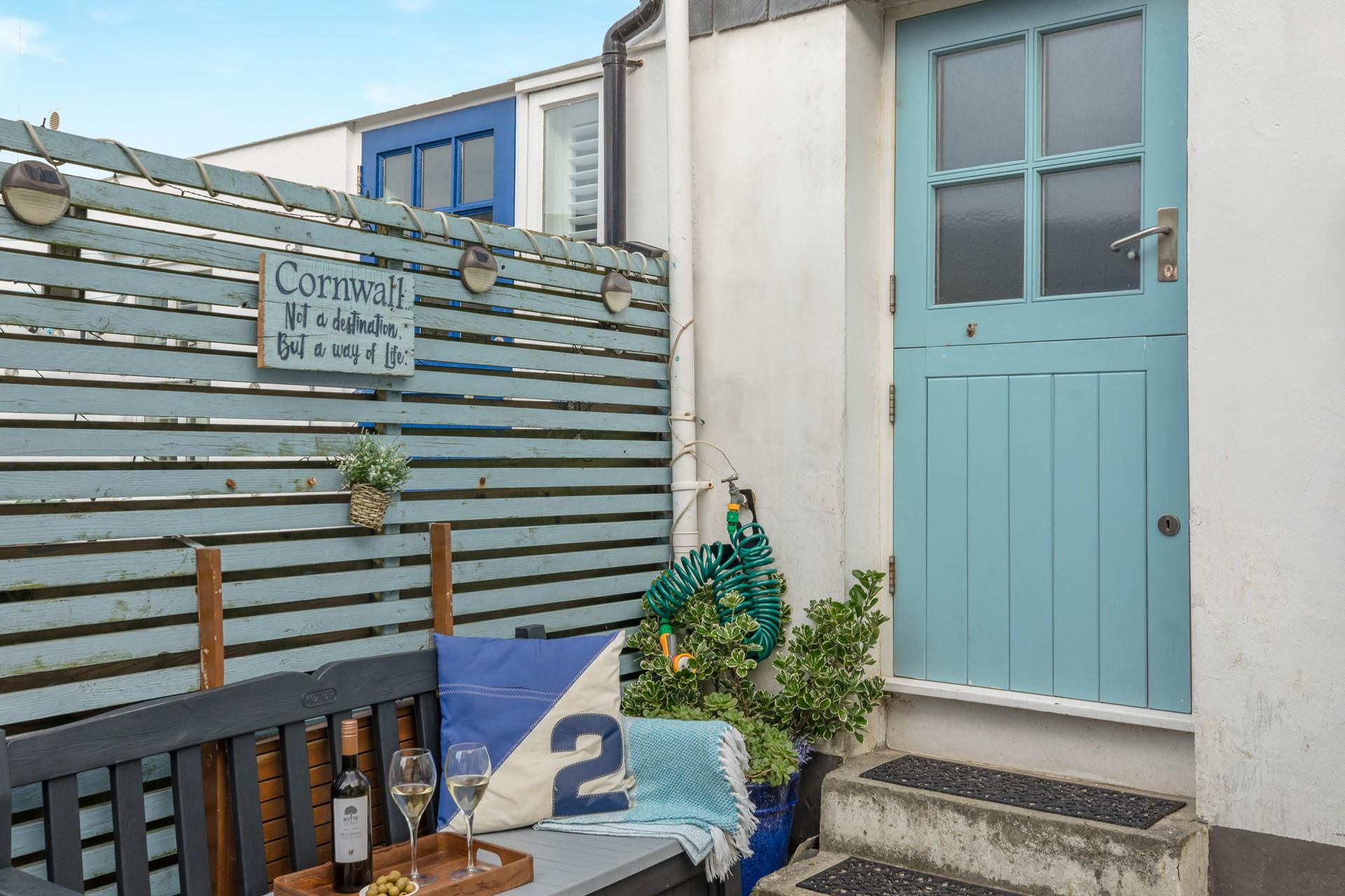 Tuck into wine and nibbles in the sun.