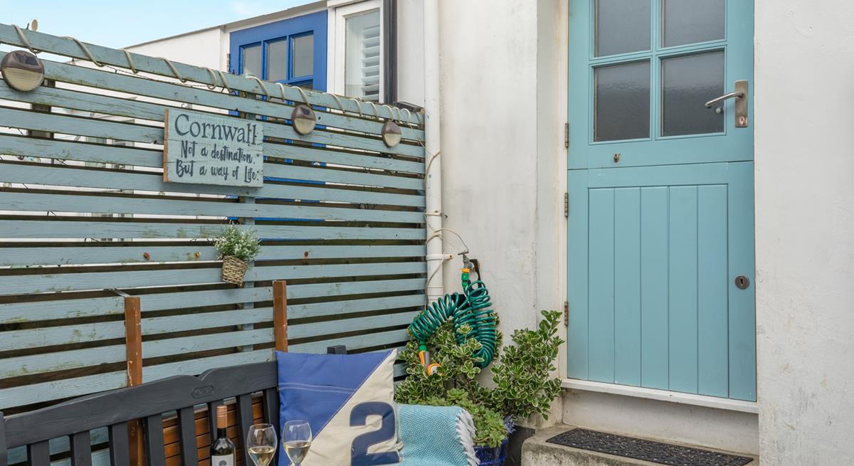 Tuck into wine and nibbles in the sun.