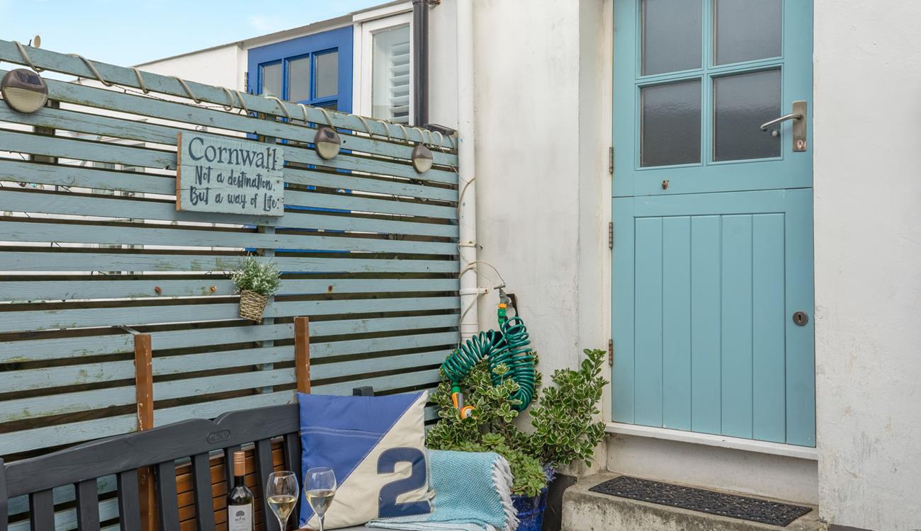 Tuck into wine and nibbles in the sun.