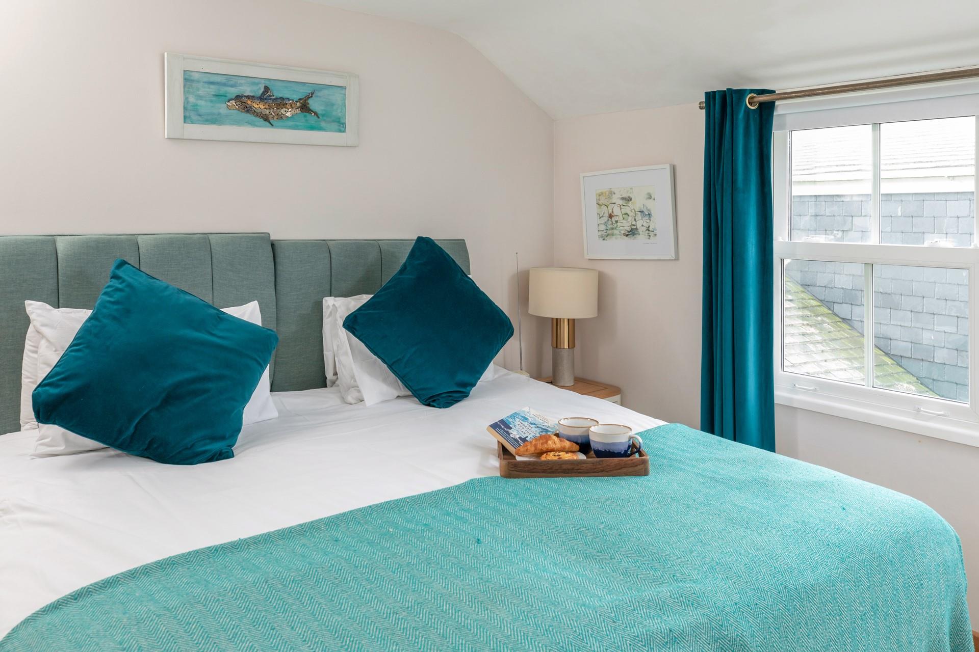 Sink into the sumptuous super king size bed for a blissful night's sleep. 