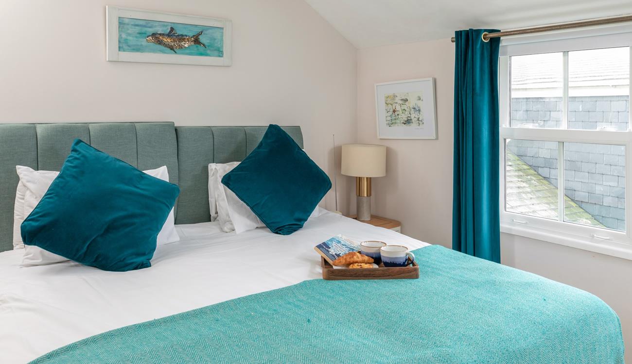 Sink into the sumptuous super king size bed for a blissful night's sleep. 