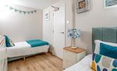 We love the 'Surf's Up' bunting, and continued blue colour scheme in the twin room.  - Thumbnail Image