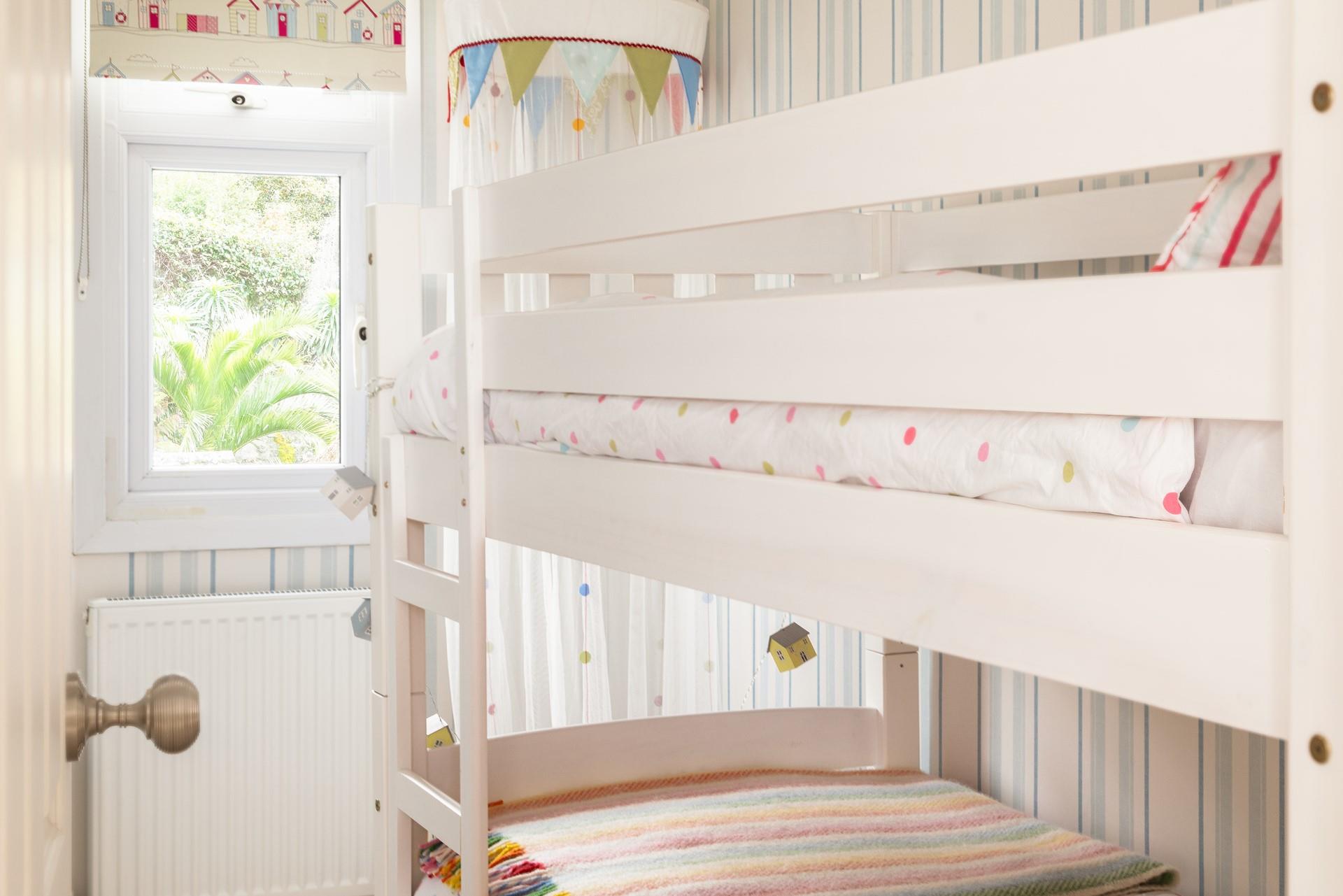 The younger members of your party will love waking up in their own room and even have a bit of space for their toys. 