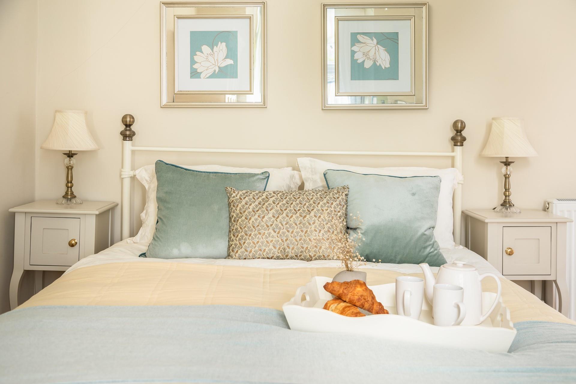 Bedroom 1 is located on the ground floor, next to the sitting room, and has the privacy of an en suite shower room. 