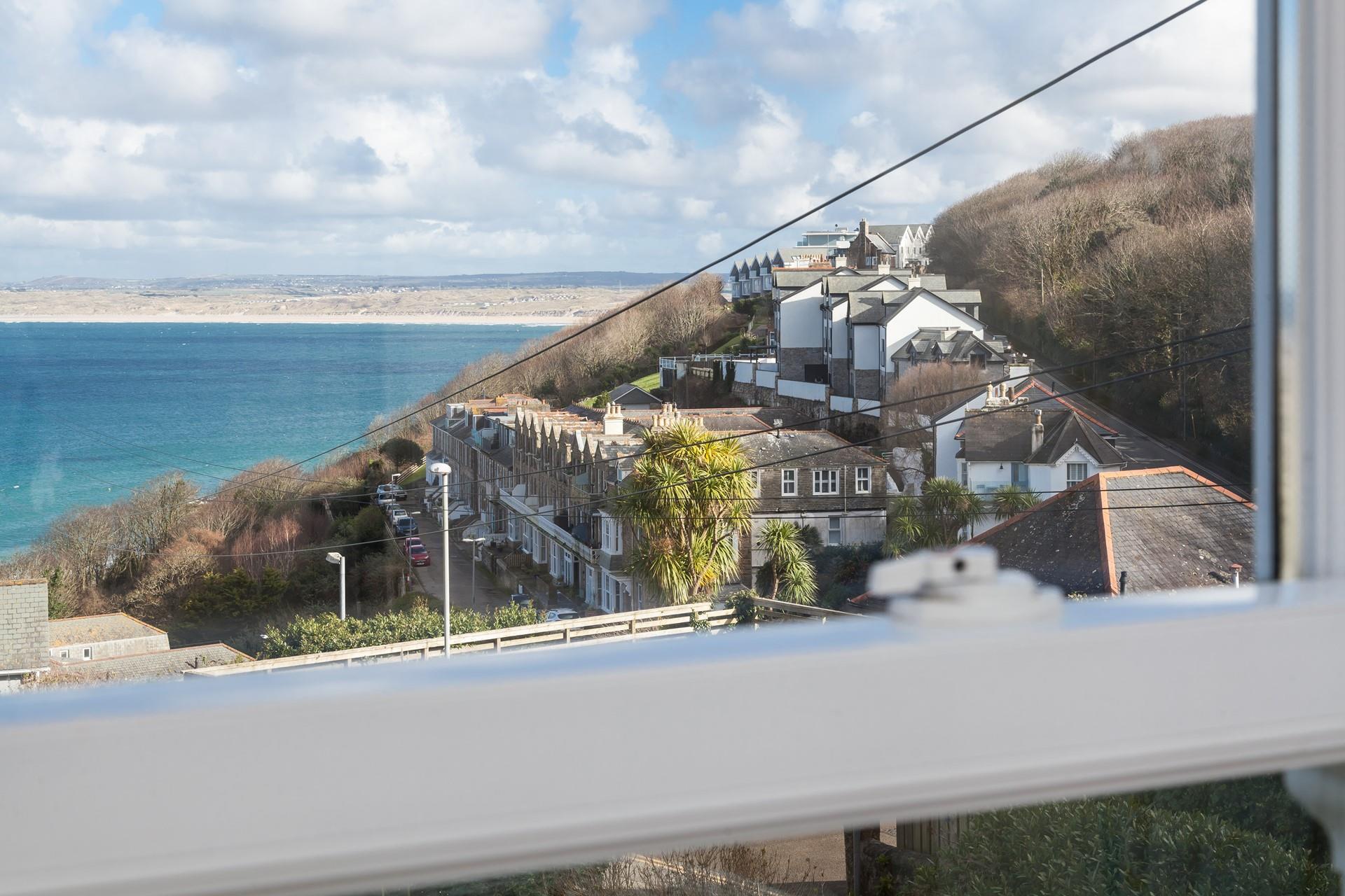 Sit back and enjoy the gorgeous sea view from this lovely home.
