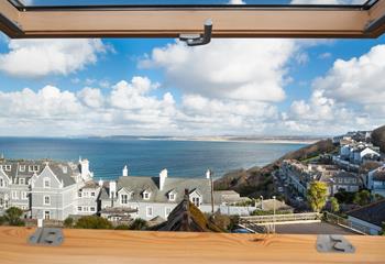 Bedroom 2 has far-reaching sea views across St Ives Bay.