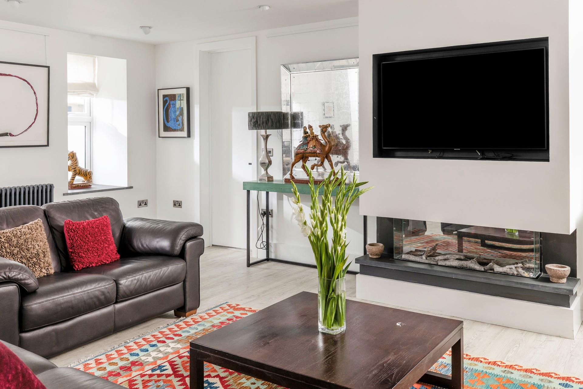 Sink into the comfortable sofas and relax after a day of exploring the nearby beaches.