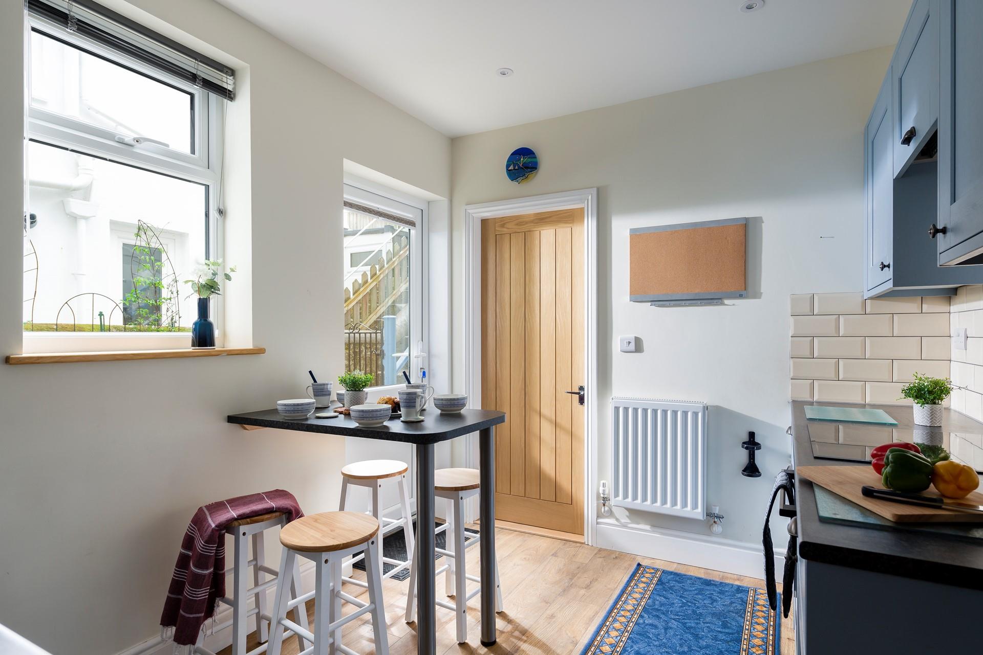 Why not enjoy breakfast at the breakfast bar in the kitchen?