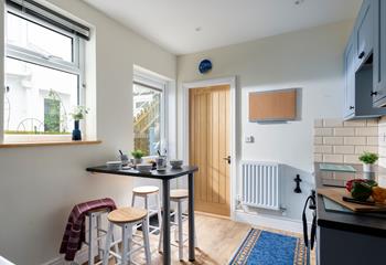 Why not enjoy breakfast at the breakfast bar in the kitchen?