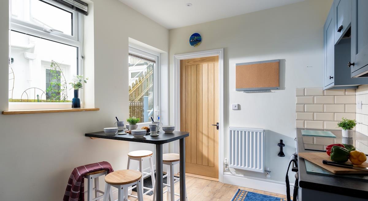 Why not enjoy breakfast at the breakfast bar in the kitchen?