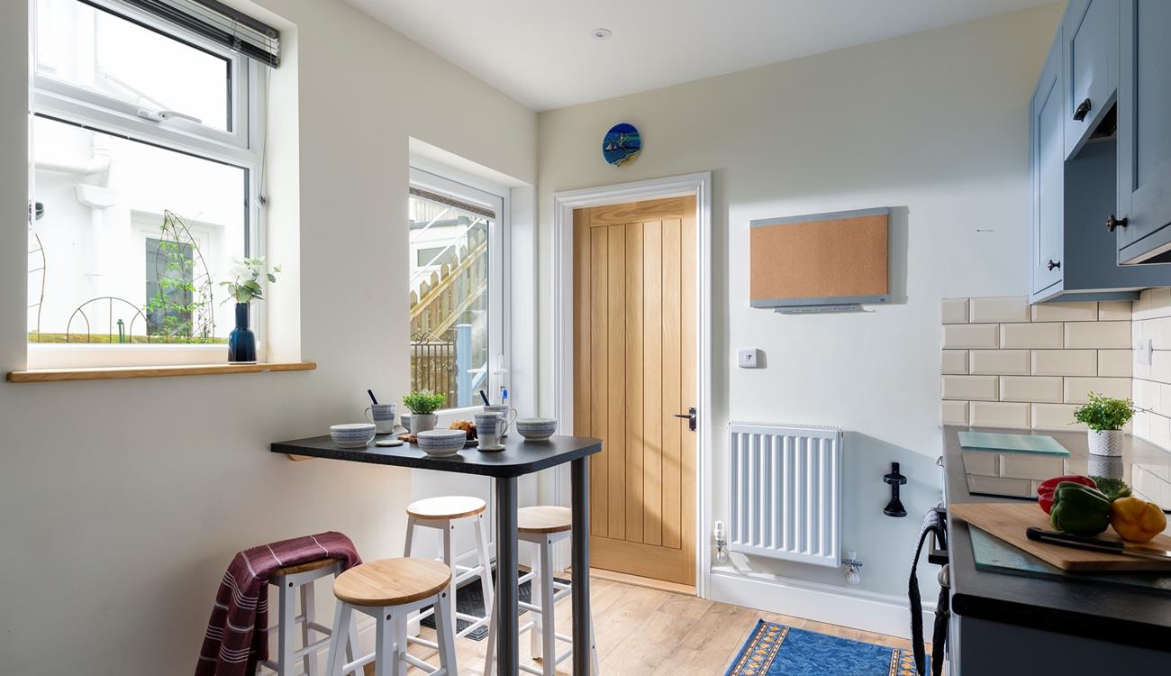 Why not enjoy breakfast at the breakfast bar in the kitchen?