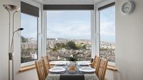 The dining table provides the perfect excuse to either dine together or play board games in the evening. 