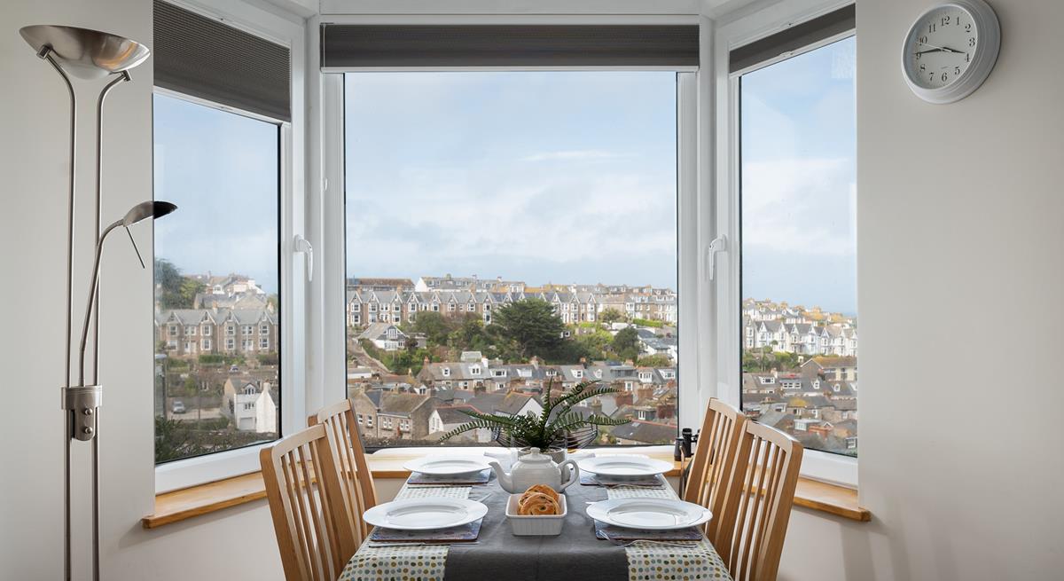 The dining table provides the perfect excuse to either dine together or play board games in the evening. 