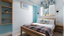 Bedroom 1 offers a relaxing, peaceful, night's sleep.