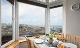 The views from the dining table are stunning; overlooking Smeaton's Pier and stretching out beyond Godrevy Lighthouse. - Thumbnail Image