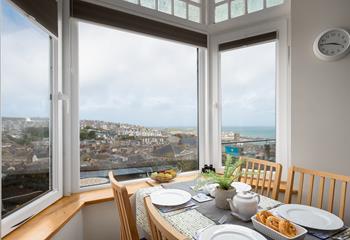 The views from the dining table are stunning; overlooking Smeaton's Pier and stretching out beyond Godrevy Lighthouse.