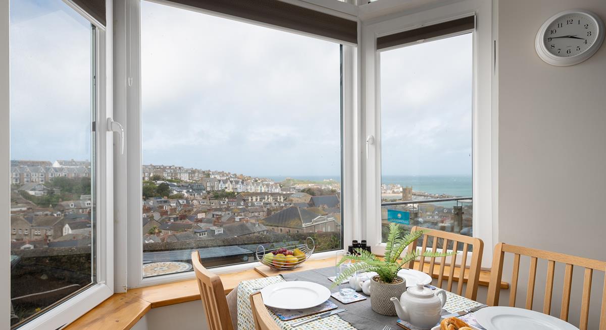 The views from the dining table are stunning; overlooking Smeaton's Pier and stretching out beyond Godrevy Lighthouse.