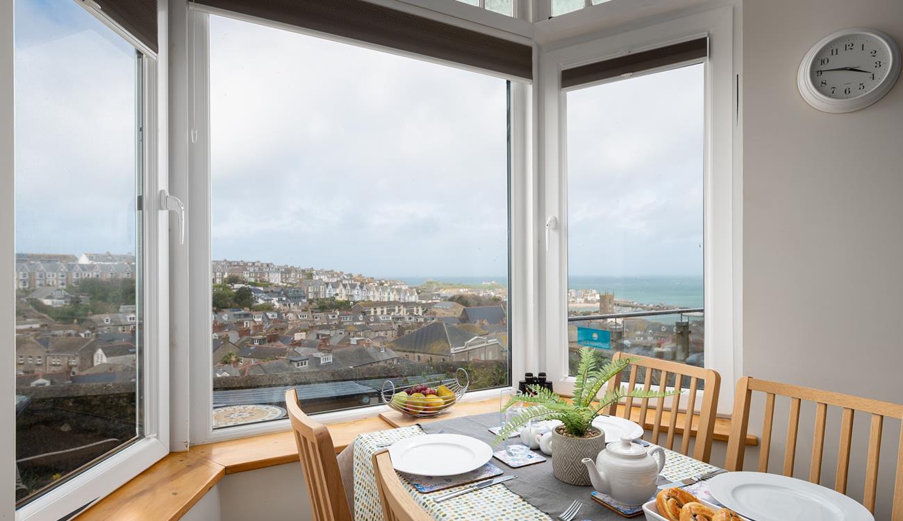 The views from the dining table are stunning; overlooking Smeaton's Pier and stretching out beyond Godrevy Lighthouse.