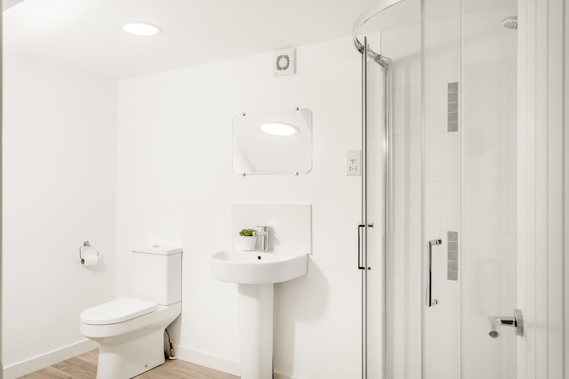 Get ready for the day in the spacious bathroom.