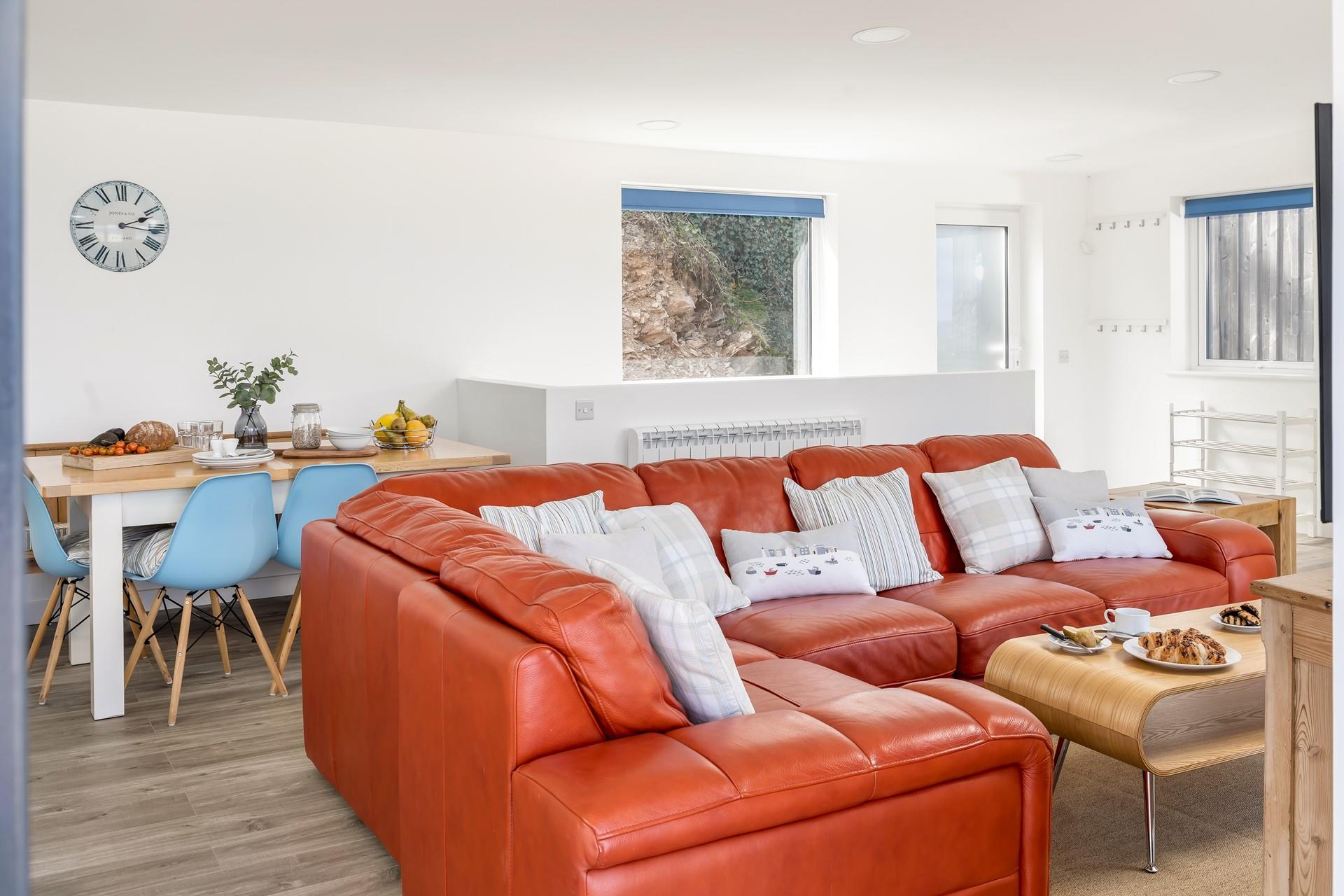 The sitting area beautifully blends style and comfort, creating a space that is homely and welcoming.