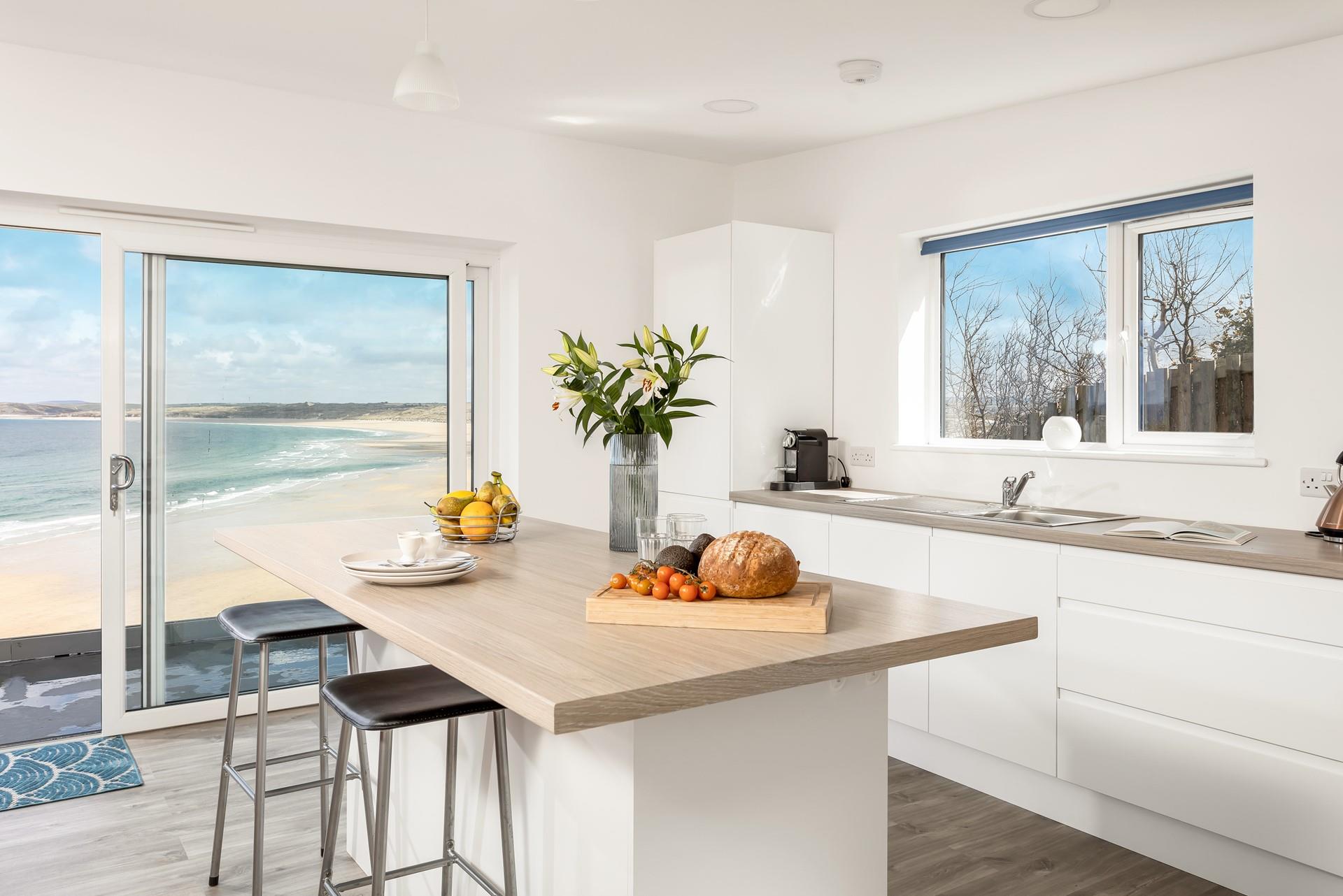 On summer days open up the large patio doors to let in the fresh air and the magical sound of the sea.