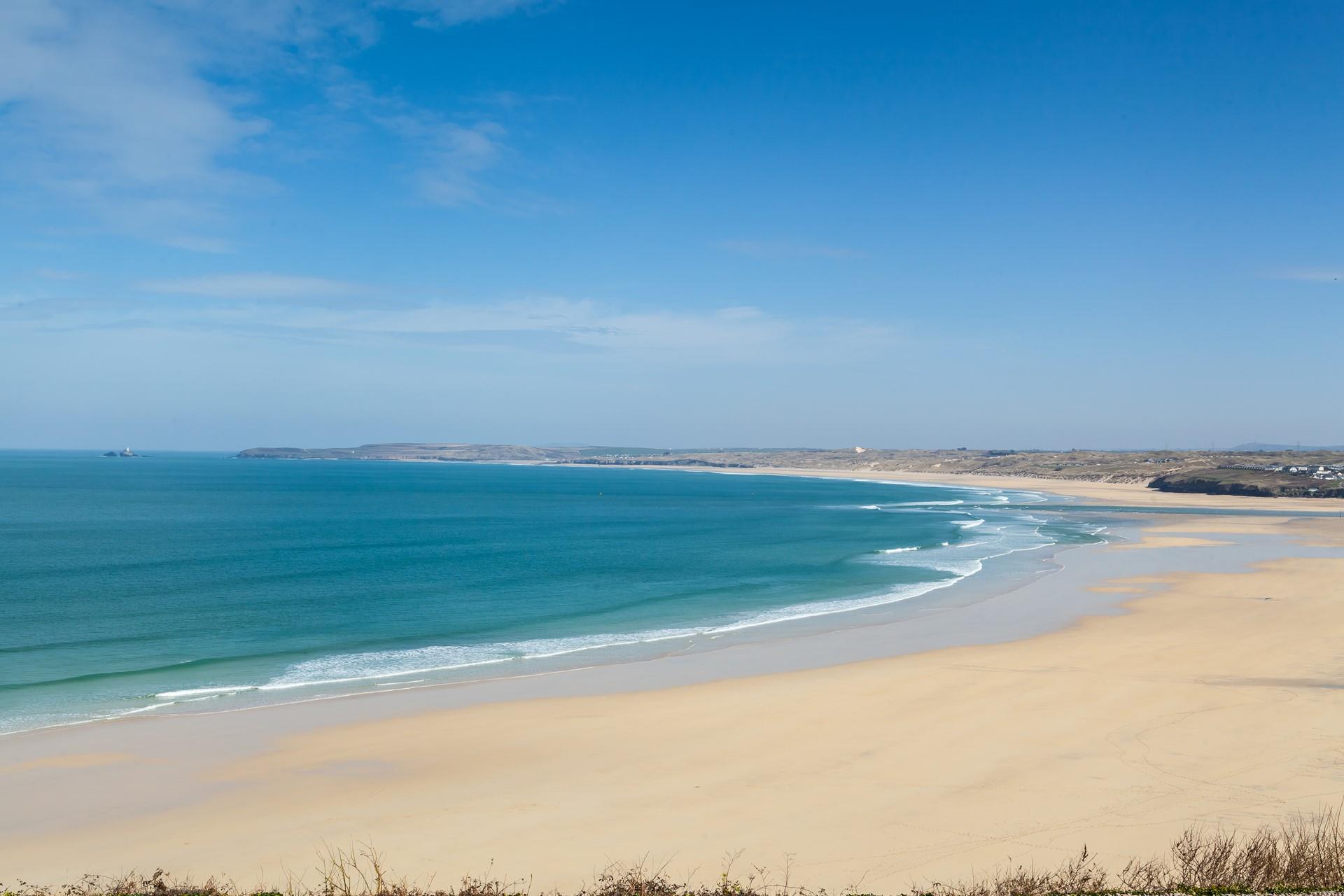 Take in the breathtaking views of Porthkidney beach across to Godrevy Lighthouse.