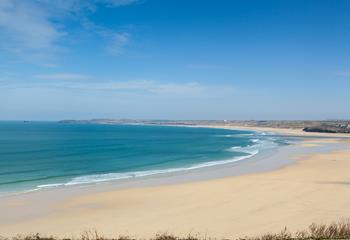 Take in the breathtaking views of Porthkidney beach across to Godrevy Lighthouse.