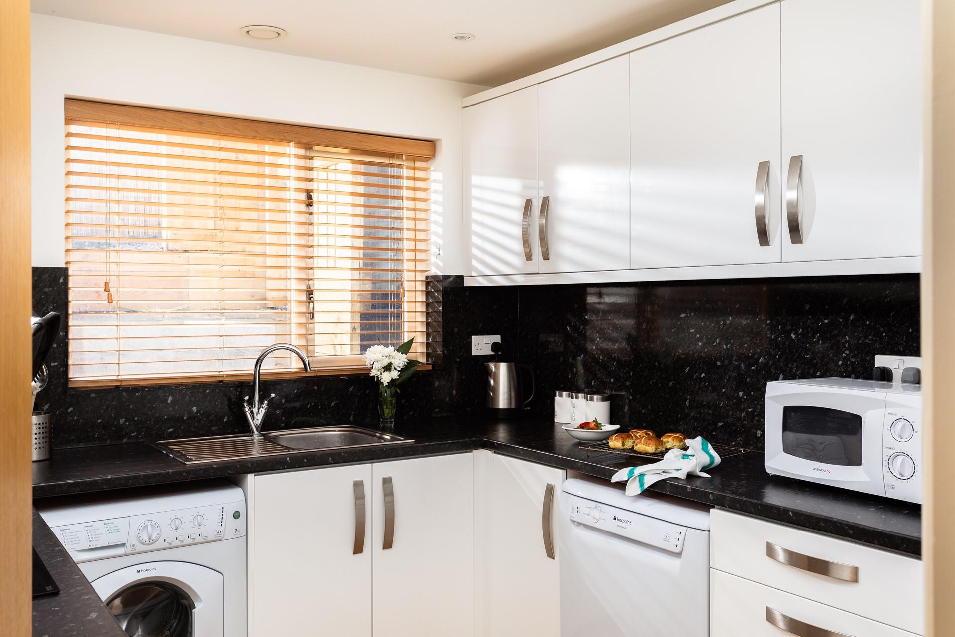 The modern kitchen is beautifully finished.