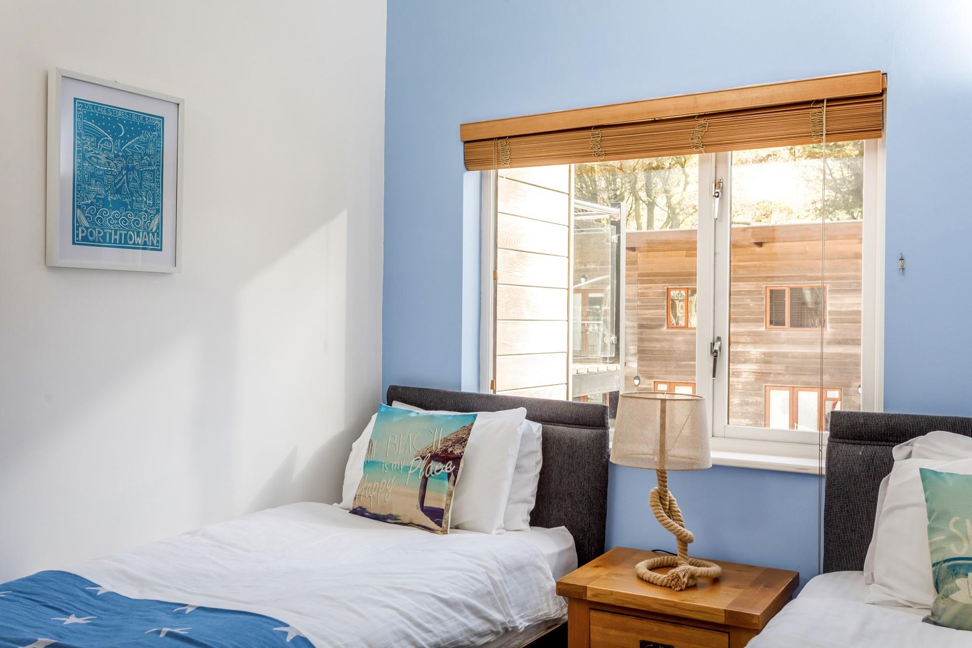 The twin bedroom is the perfect space for the little ones to relax.